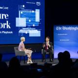 rep lieu seated during interview at Washington Post event with "Future of Work" sign in background