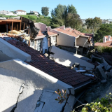 Rollings Hills Estates will receive $750,000 in federal funding to improve stormwater infrastructure, it was announced Friday, Nov. 21, 2025, through Congressman Ted Lieu’s office. The Palos Verdes Peninsula has been hit hard by heavy rains in recent winters impacting the whole region. A landslide damaged homes on Peartree Lane in Rolling Hills Estates, pictured in July 2023. (Photo by Axel Koester, Contributing Photographer)